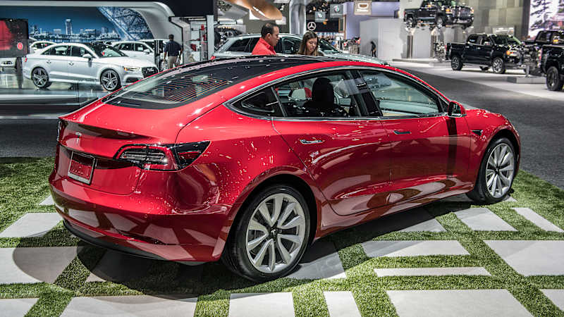 Tesla bonds, stock fall as Moody's downgrades the company